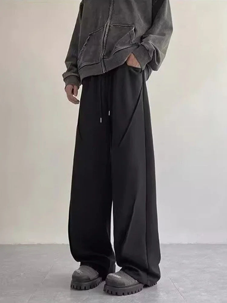 Pantalones corte recto plizado con cintura elástica